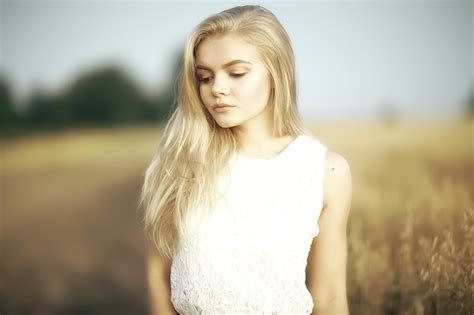 Premium Photo Blonde Long Hair Nature Summer Happy Adult Girl With Developing In The Wind