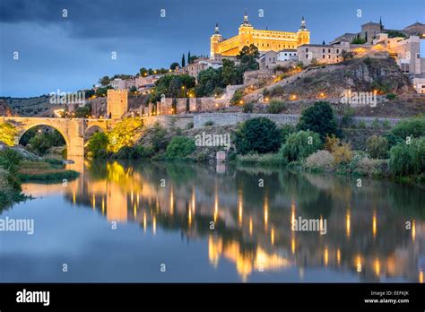Toledo Spain Old Town Skyline At The Alcazar On The River Stock Photo