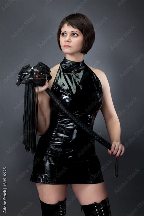 Девушка с плёткой фотография Stock | Adobe Stock