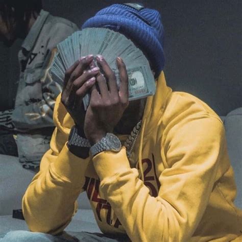 Download Nba Youngboy Pfp Money Flexing Wallpaper