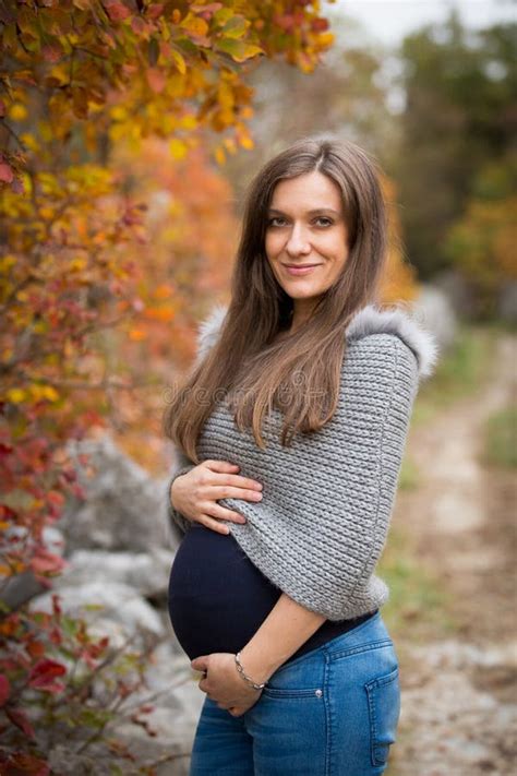 Beautiful Pregnant Brunette In Nature Stock Photo Image Of Caucasian Portrait