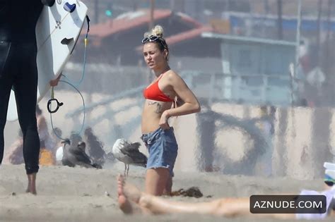 Miley Cyrus Sexy In A Cheeky Red Bikini With Boyfriend Liam Hemsworth In Malibu Aznude