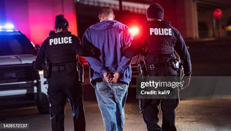 167,482 People Being Arrested Stock Photos, High-Res Pictures, and ...