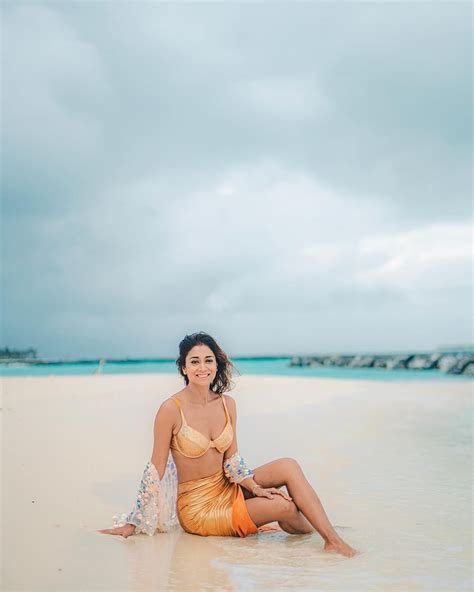 Shriya Saran Radiates In Golden Bikini