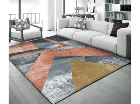 Ковер к серому дивану - 90 фото