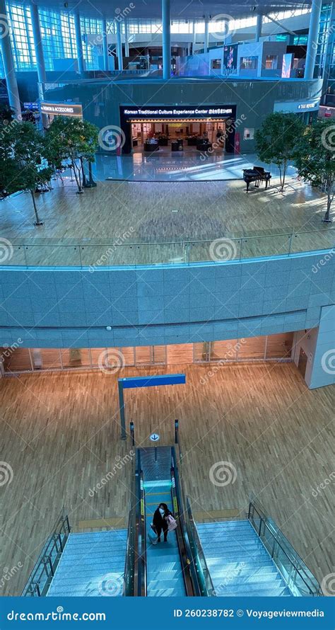 Terminal Empty With Woman Alone At Airport Editorial Photography