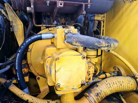 Dawid Gwóźdź - Maszyny budowlane - KOMATSU PW170ES-6K