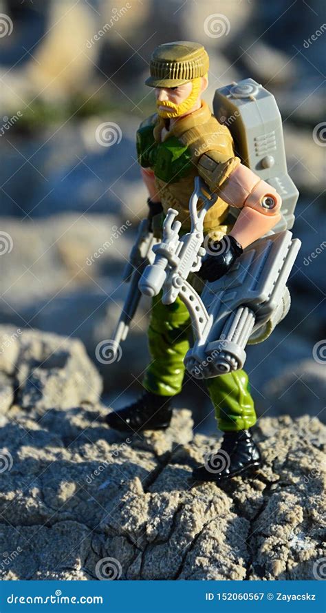 Toy Action Figure Of Gi Joe Series Named Rock N` Roll Standing On Guard