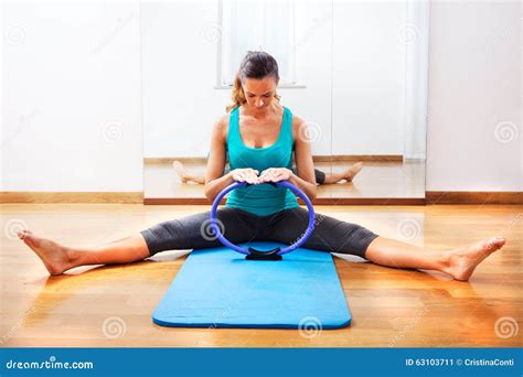 Fitness Teacher Making Exercisese with the Circle Tool Stock Image ...