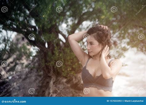Pretty Asian Woman In Blue Bikini Posing On The Beach Stock Image Image Of Beach Ocean