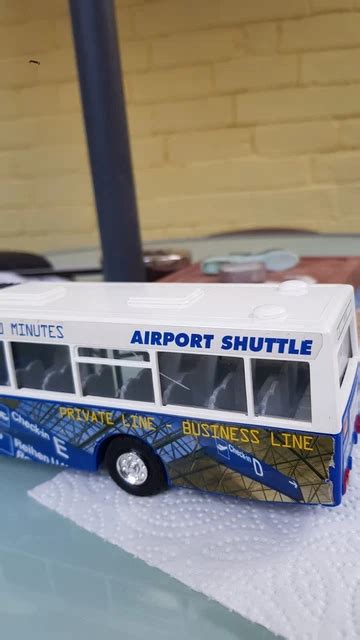 airport shuttle city double flexy bendy bus dickies opening doors blue