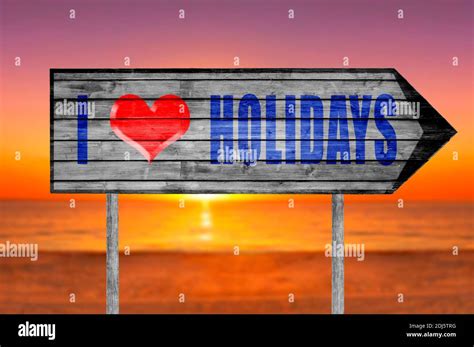 I Love Holidays Wooden Sign On A Beach Background Stock Photo Alamy