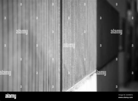 Greyscale Shot Of The Textures And Patterns On A Cement Wall Stock