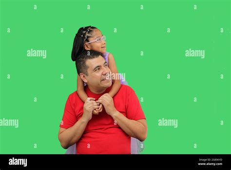 Divorced Single Dad Hugs His Year Old Brunette Latina Daughter Hugging Each Other In Piggy