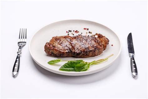 A Perfectly Cooked Striploin Steak with a Juicy, Tender Texture Stock Photo - Image of plate ...