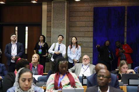 Delegates Following The Session From The Back Of The Room INC3