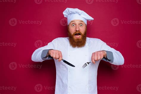 shocked chef with beard and red apron is ready to cook 20724183 Stock ...