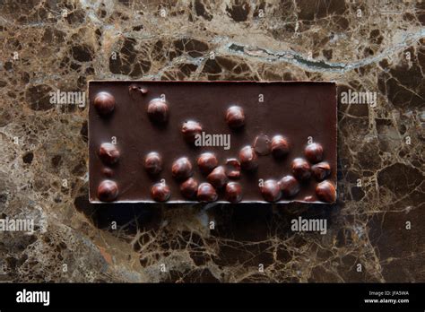chocolate bar with nuts Stock Photo - Alamy