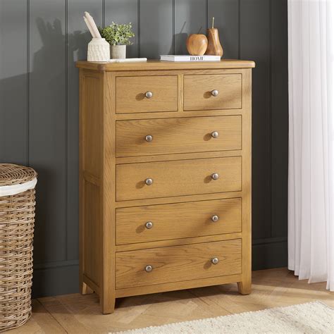 Cotswold Rustic Smoked Oak Over Drawer Tall Chest The Furniture