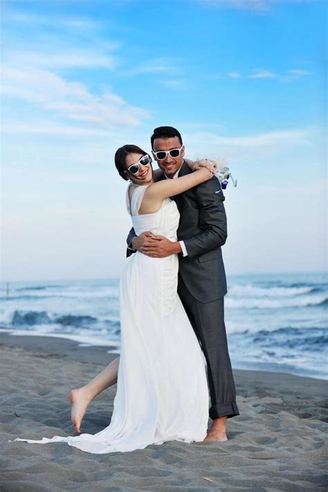 romantic beach wedding at sunset 12643247 Stock Photo at Vecteezy