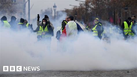 France Fuel Protests Tear Gas Fired In Clashes In Paris Bbc News