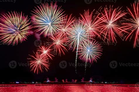 Amazing Beautiful Colorful Fireworks Display On Celebration Night Showing On The Sea Beach With