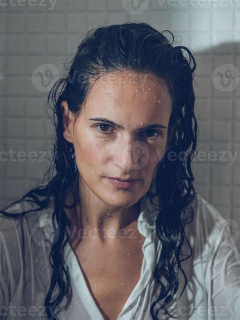 Sopping Dressed Brunette In Bathroom Stock Photo At Vecteezy