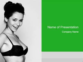 Stunning Brunette Woman In Black Lingerie Poses With A Smile On Grey Background PowerPoint