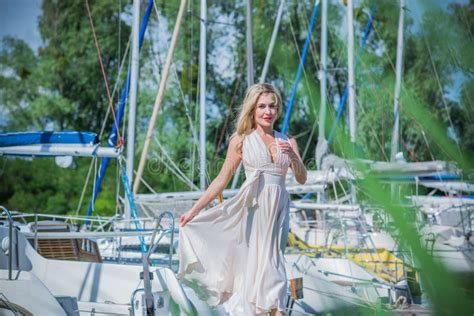 Nice Blonde Woman At Vacation In Yacht Club Stock Image Image Of Look Fashion