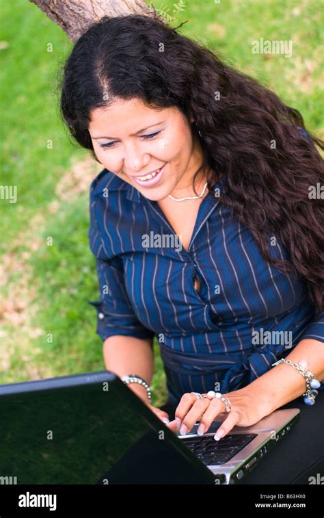 Lady Latina With Laptop Outdoors Stock Photo Alamy