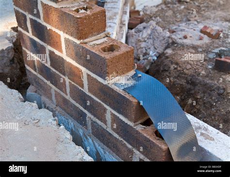 damp proof membrane  built   brick wall house extension stock