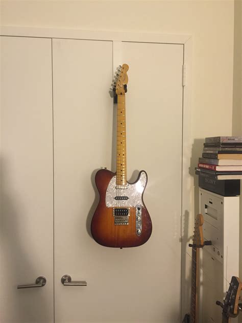 Musicians found a guitar hanger that protects fragile finishes 25