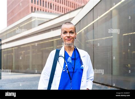Mature Female Doctor With Shaved Head Stock Photo Alamy
