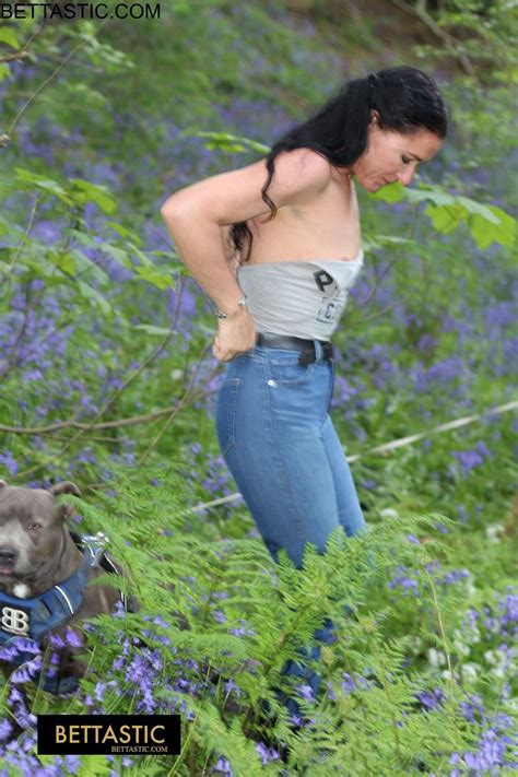 Gorgeous Brunette Babe Poses In Her Clothes Outdoors Photos