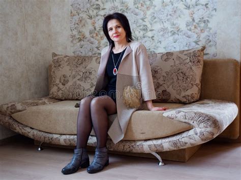 Girl Brunette Portrait Sitting On The Couch Stock Image Image Of Lifestyle Cute