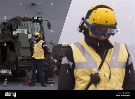 Crew on board HMS Queen Elizabeth, as the Royal Navy's new aircraft ...