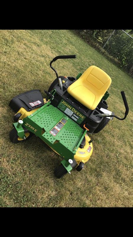 John Deere Z335e 20 Hp V Twin Dual Hydrostatic 42 In Zero Turn Lawn Mower With Mulching