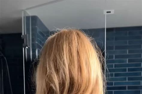 Amanda Holden strips totally naked in risqué video