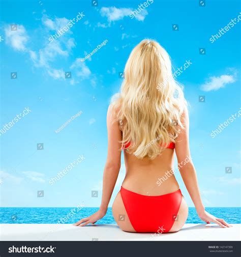 Sexy Blonde Woman Sunbathing By Sea Stock Photo Shutterstock