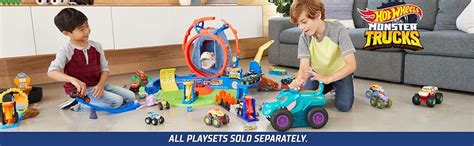 Amazon Hot Wheels Monster Trucks T Rex Volcano Playset With 1 64 Scale Race Ace Toy Truck