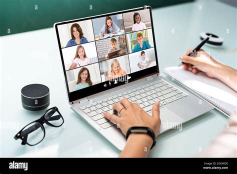 Teacher Online Meeting With Children. Teaching Class Stock Photo - Alamy