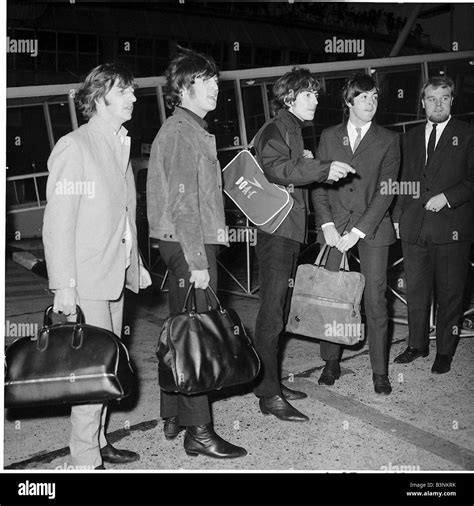 Beatles files The Beatles at London airport Circa 1965 Stock Photo - Alamy