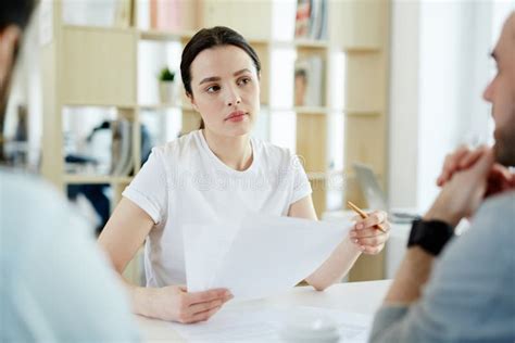 Young Woman Listening In Meeting With Clients Stock Image Image Of