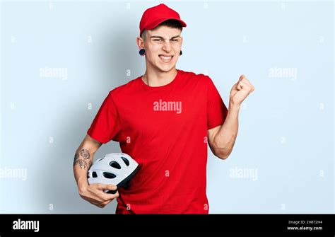 young caucasian boy  ears dilation wearing delivery uniform  cap