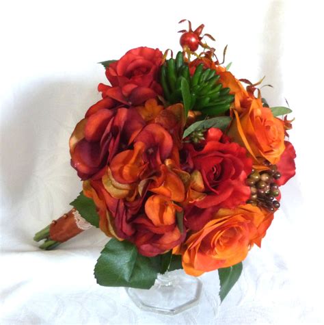 Fall color rose bouquet flowers in shades of orange and reds