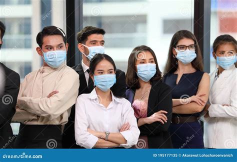 Group Of Business People From Various Sex Including Gay And LGBTQ Wearing Facial Mask As New