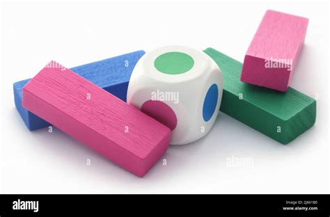 Jenga Game Of Colorful Wooden Blocks Over White Background Stock Photo