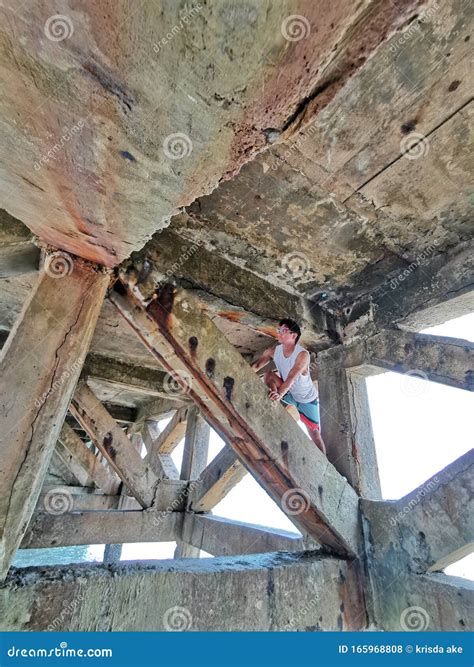 Silhouette Offender Shooting Pistol In Darkness. Focused Man Pulling