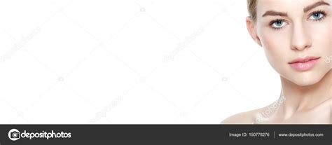 Pretty Girl With Blue Eyes And Blond Hair With Naked Shoulders Looking At Camera Smiling