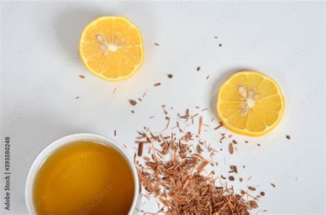 Cup Of Tea Catuaba Bark And Lemon On White Background Natural Herbal